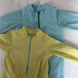 Set of 2 Primary One Piece Rash Guards